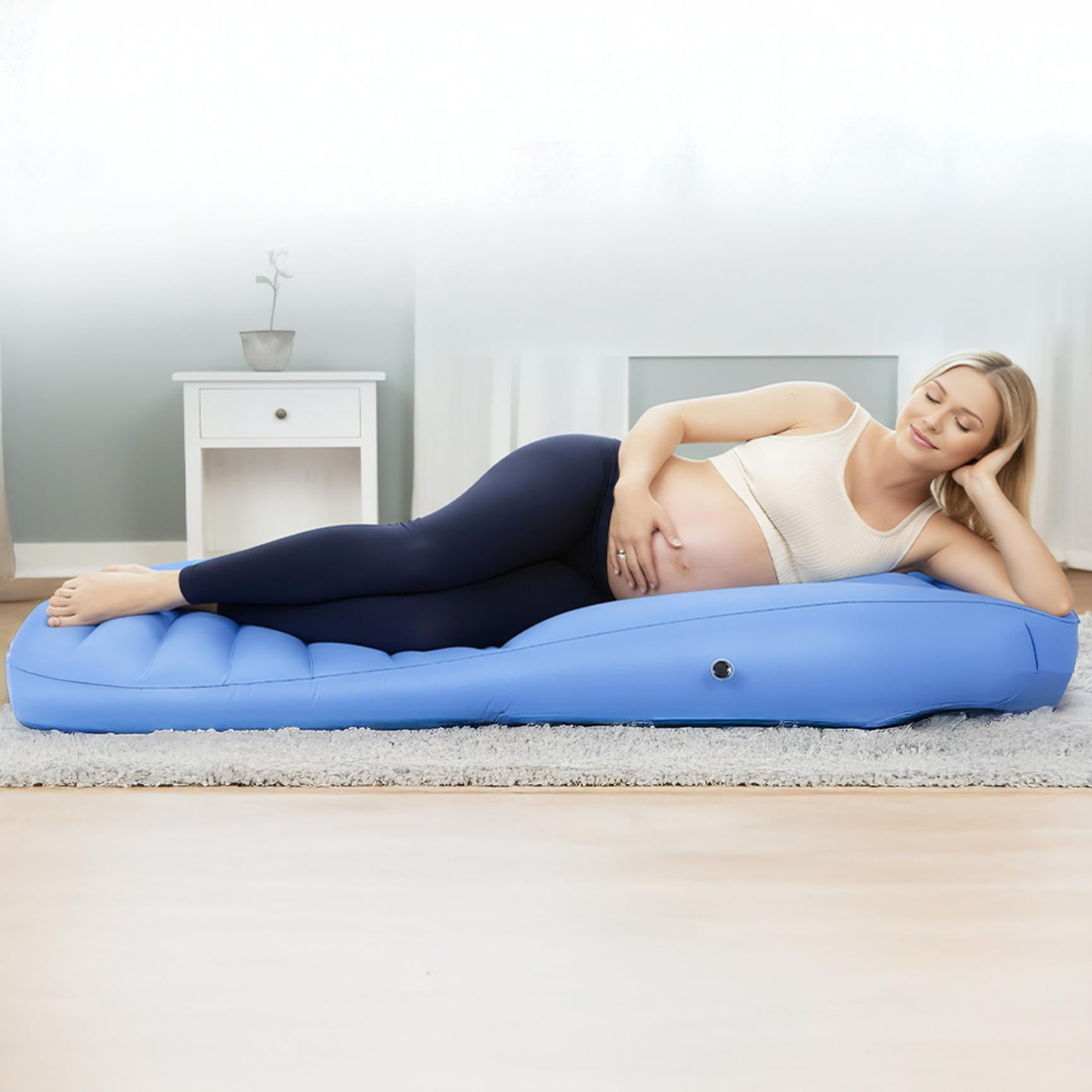 Matelas gonflable ergonomique pour femme enceinte